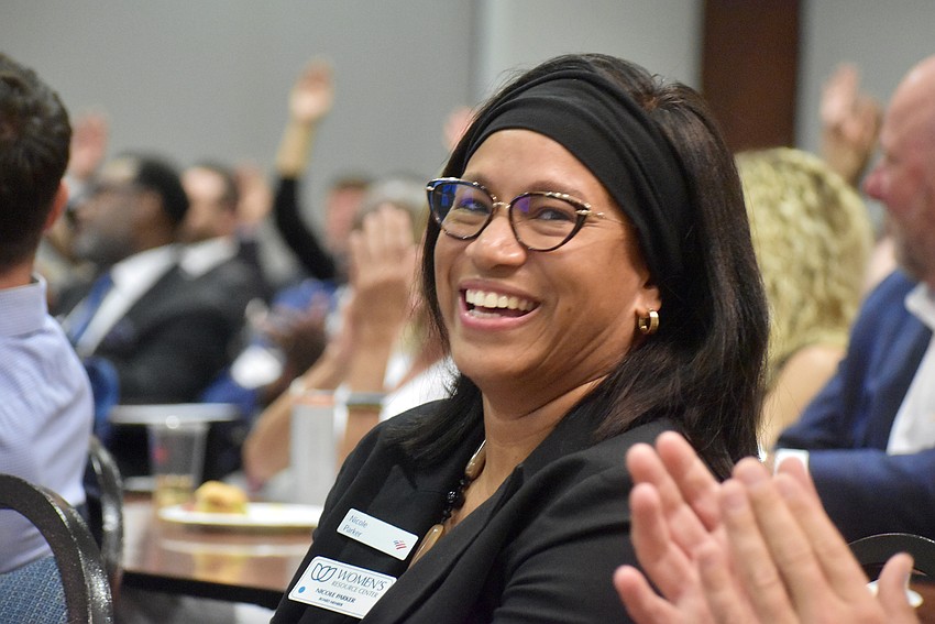 Nicole Parker is vice president of global commercial banking and serves on the board for the Women's Resource Center.