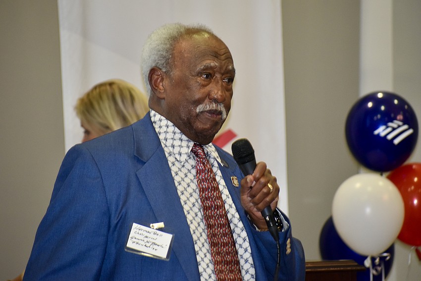 Herman Bell, chair of the Board of Trustees for the Gamma Xi Boule Foundation, gives an impromptu speech thanking Bank of America.
