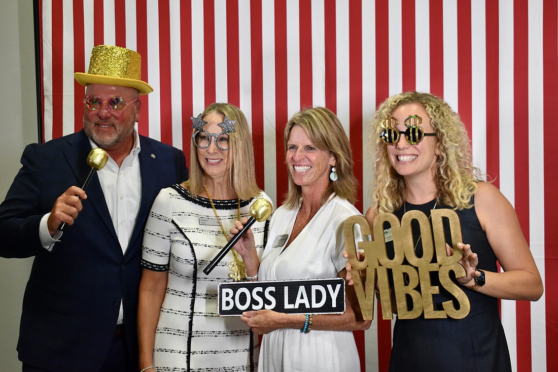 The Take Stock in Children crew includes Scott Atkins and Heather Clark with Bank of America, along with Executive Director Lisa Bechtold and the incoming chair Brittany Lamont.