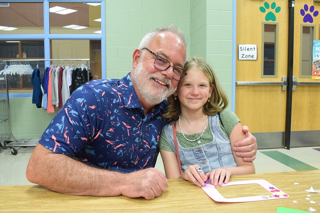Kim Lane travels from Illinois to be with his granddaughter fifth grader Sadie Nowakowski during Grandparents Night. "It's exciting as long as she's here," Lane says.