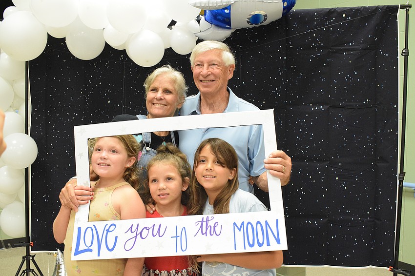 Becky Woodruff and her husband, Bob Woodruff, get a picture-perfect moment with their granddaughters third grader Holly Ryan, first grader Amelia Ryan and fourth grader Cassandra Ryan.