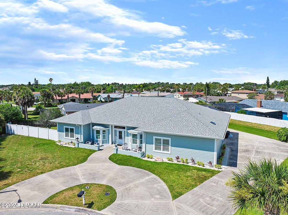 The house is a 5/3 and has a pool, a fireplace and 2,809 square feet. Photo courtesy of Adams, Cameron and Co. Realtors