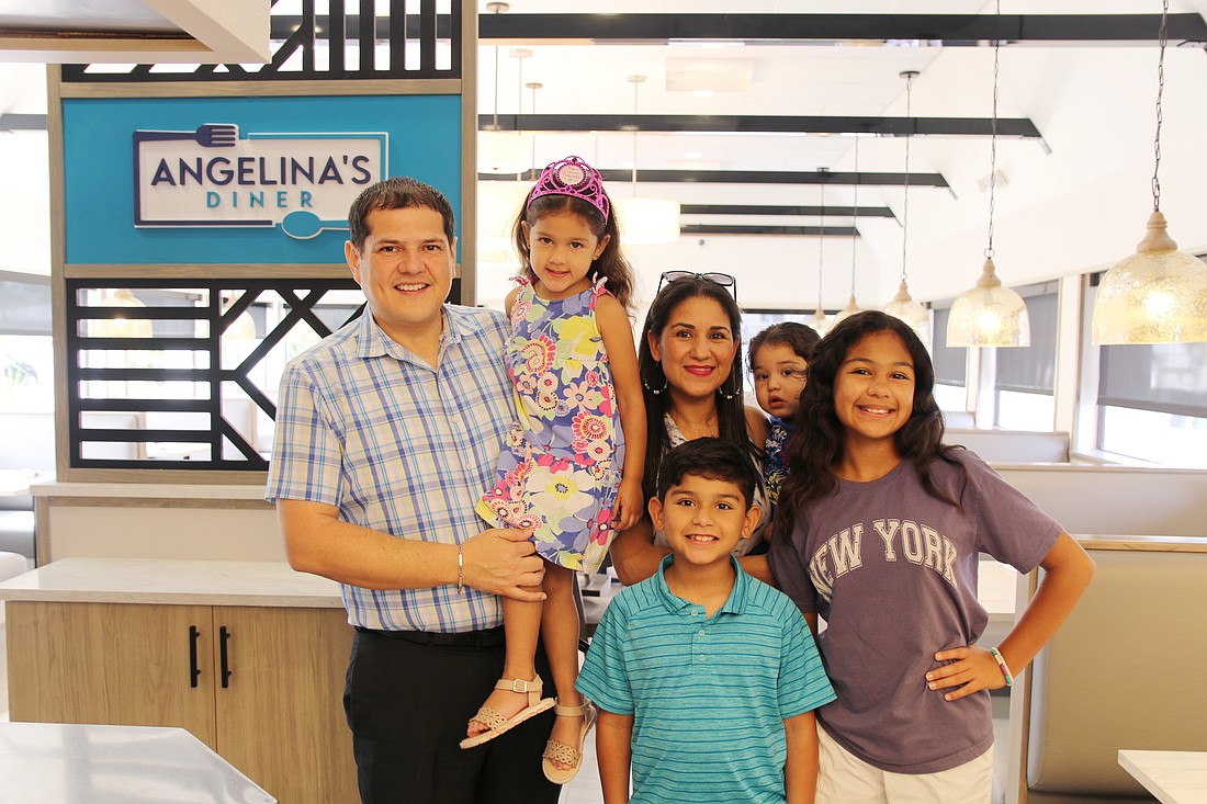 Javier and Jeannie Alvarez, with their four children: Emmie, Nicolas, Lucas and Angelina. Photo by Jarleene Almenas