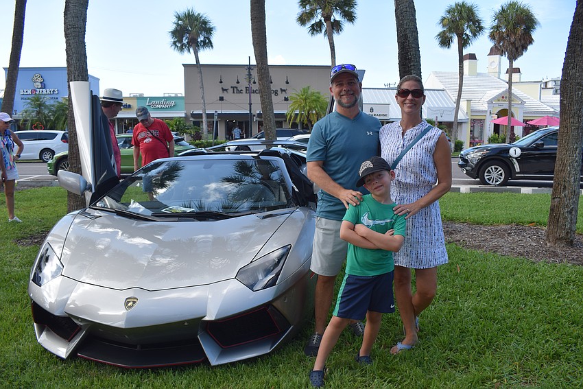 Brian, Holly and Austin Highfield at Exotic Cars on the Circle.