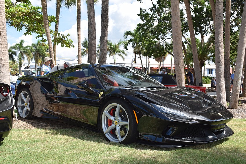 At Exotic Cars on the Circle, car owners display their cars to raise money for Flight to the North Pole.