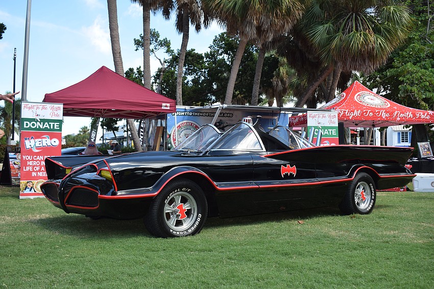At Exotic Cars on the Circle, car owners display their cars to raise money for Flight to the North Pole.