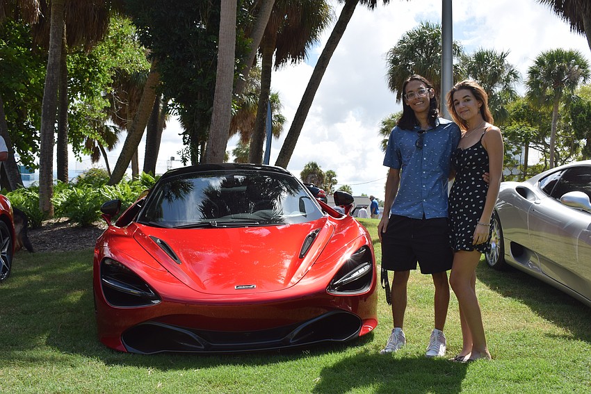 Raymon Chavez and Amily Jabr visting from Orlando at Exotic Cars on the Circle.