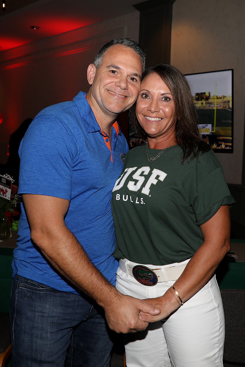 Gators may rival Bulls, but duo Greg and Daria Ferreira are a winning team.