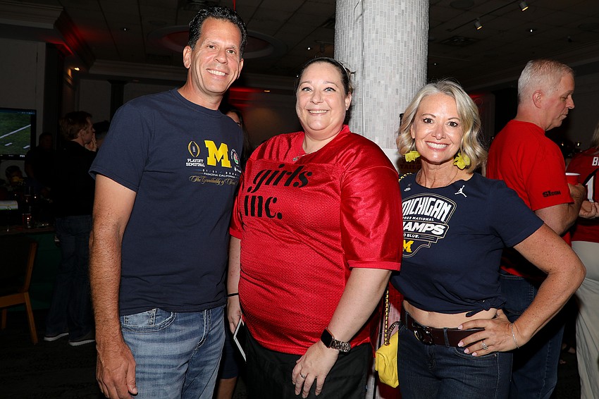 Adam Heller, Kellie Mizel and Megan Heller call time-out for a quick photo.