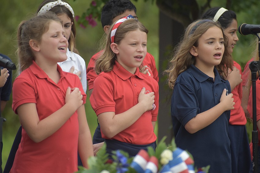 Third-graders from Saint Stephen's Episcopal School in Bradenton sing 