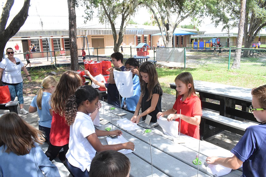 Third graders are hard at work created their oyster rag pots.