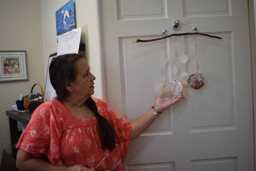 Debbie Lemieux taught herself to make suncatchers out of old jewelry and trinkets.