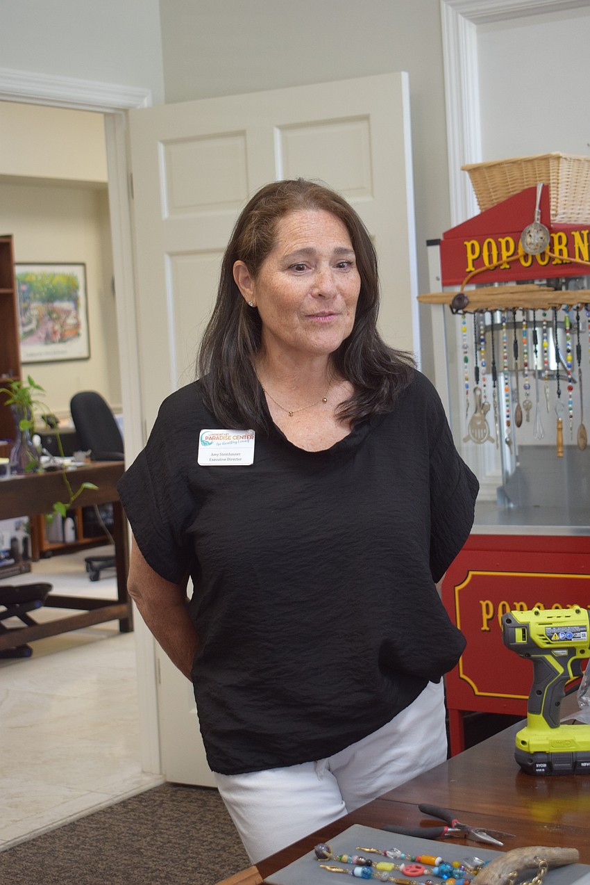 Executive Director of the Paradise Center Amy Steinhauser checks on the 