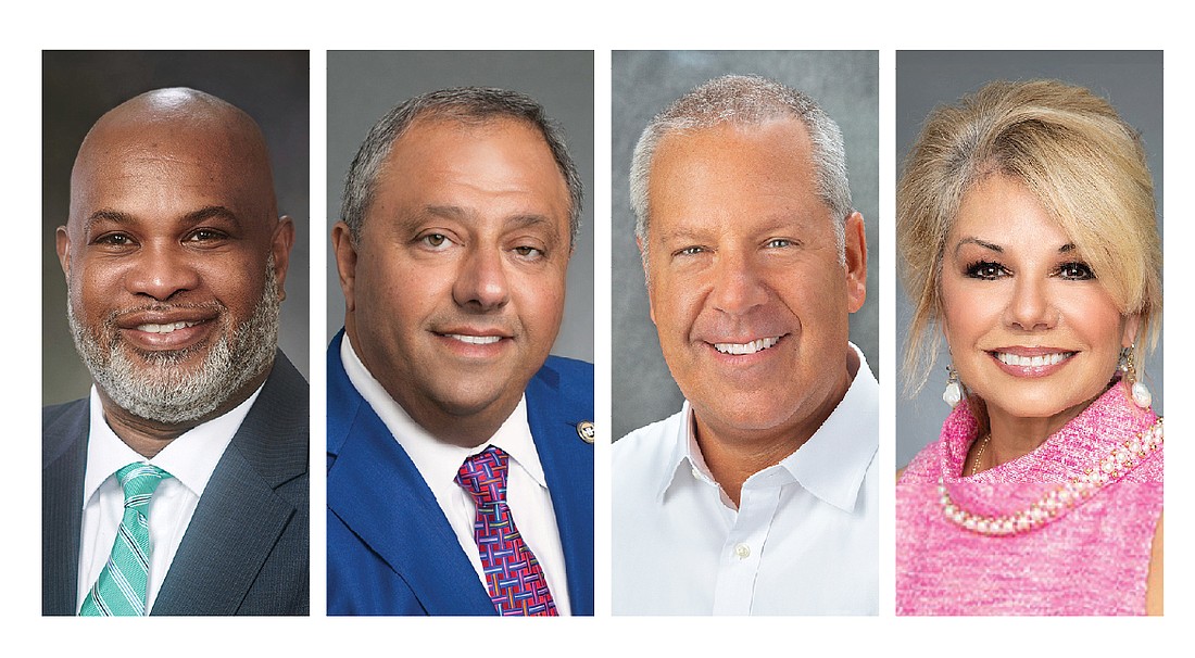 Eric Green, CEO of JaxPort; Jack Hanania, founder of Hanania Automotive Group; Joe Hinrichs, president and CEO of CSX; and Ari Jolly, vice president and assistant general counsel at Florida Blue.