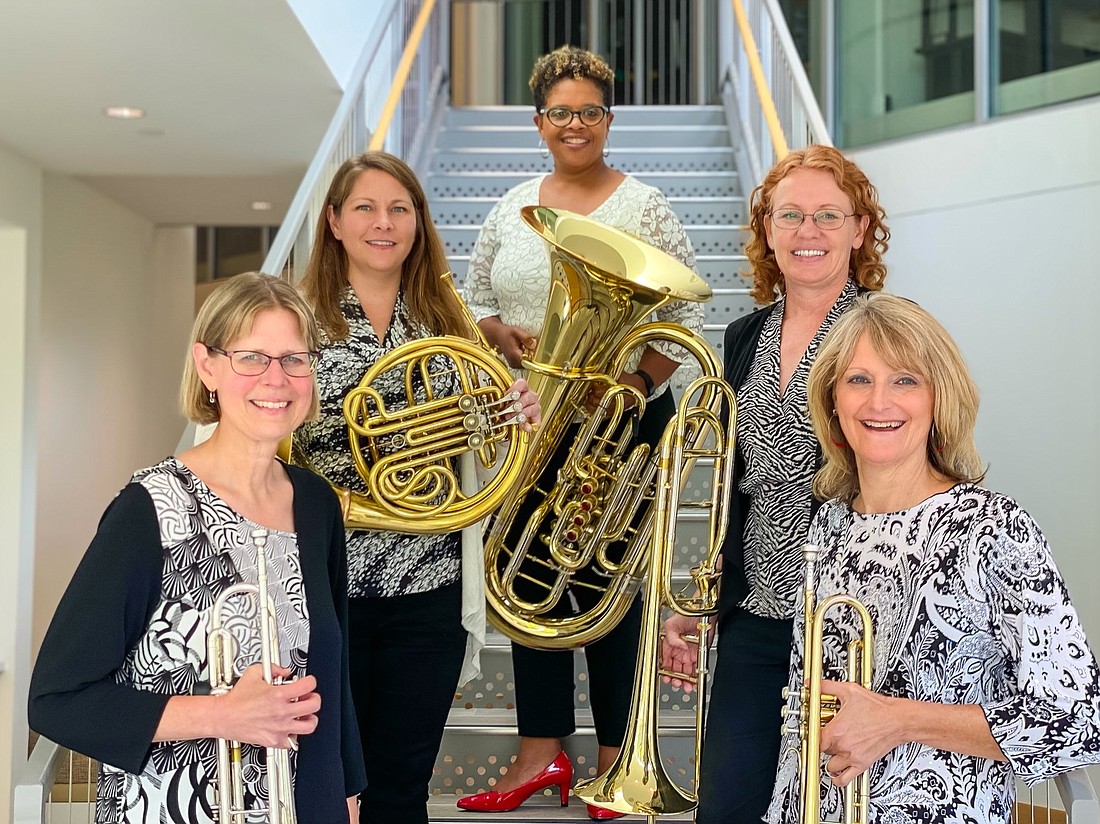 Stiletto Brass consists of (left to right) Susan Rider on trumpet, Stacie Mickens on horn, Velvet Brown on tuba, Natalie Mannix on trombone and Amy Gilreath on trumpet.