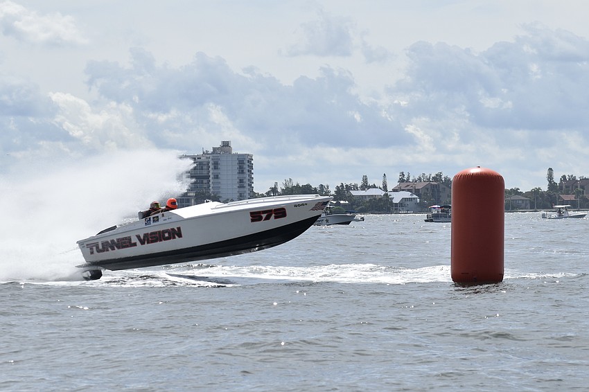 Tunnel Vision of Pasadena, Maryland, with Michael Mccolgan and Rob Bryant, approaches a buoy on the course.