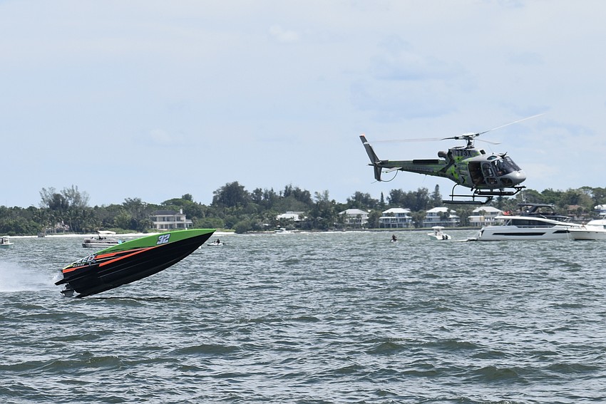 Speed Marine of Brick, New Jersey, with Kyle Miller and Jay Wohltman, makes a leap from the water.