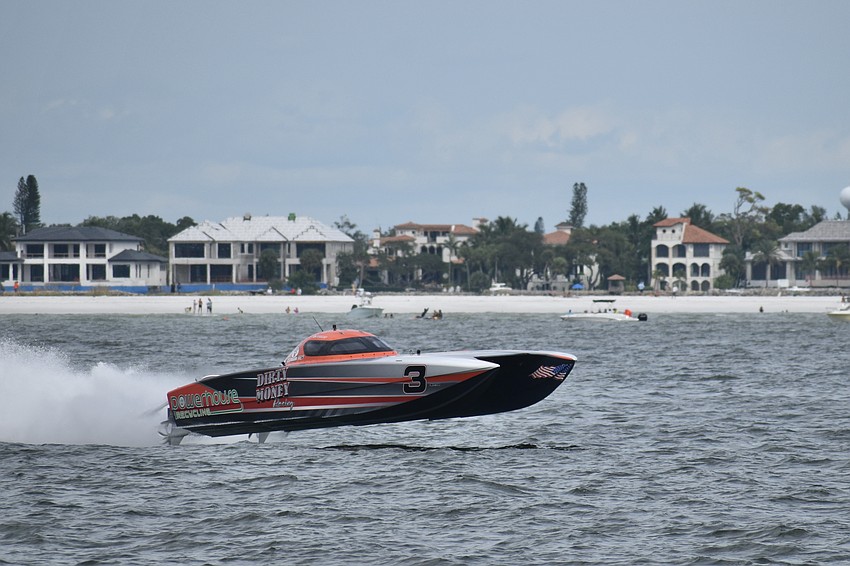 Dirty Money Racing / Powerhouse Recycling of Stuart, Florida, with Brit Lilly and Bill Pyburn, glides over the water.