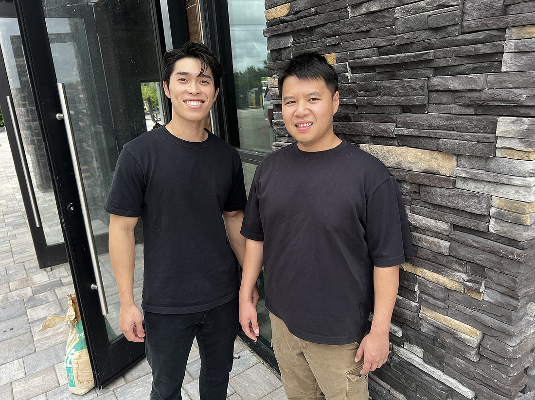 Cousins Edward Lau, left, and Vincent Liu plan to open Nomu, a Japanese restaurant, at 7540 Gate Parkway, Unit 101-103 in The Palms at Gate Parkway.