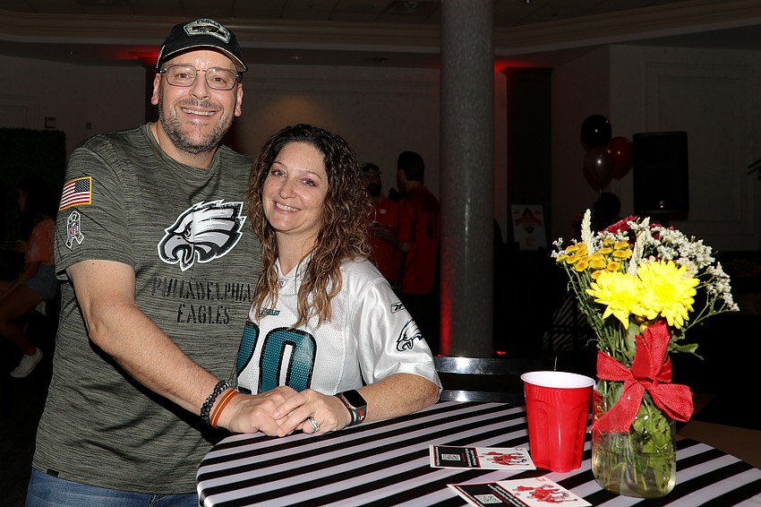 Ray and Jaime Pietak are getting their game-faces on as they plan to take the corn-hole trophy home after winning it two years ago.