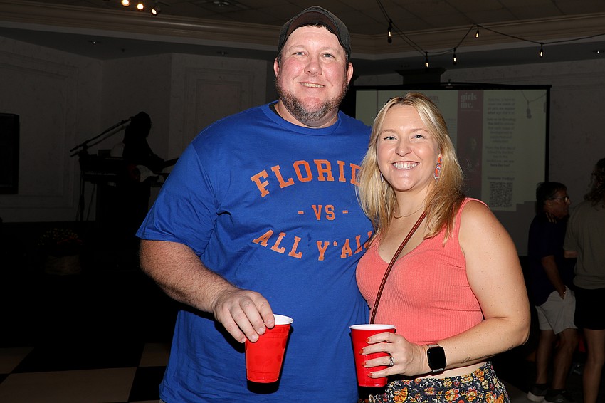 Donors Rich and Erin Cigich enjoy supporting Girls Inc., and were all smiles all night long.