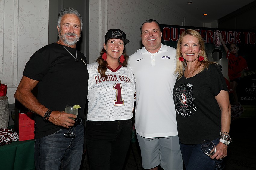 It's a time-out for some quick photos of friends Scott and Knickole Stone, Pat Robinson and Emily Walsh.