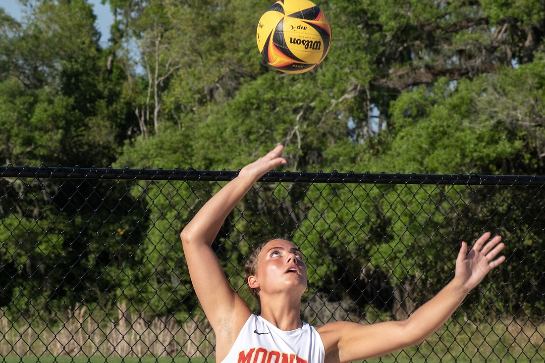 Katie Powers, a senior, is a top-end libero on the Cardinal Mooney High indoor volleyball team when not playing beach volleyball.