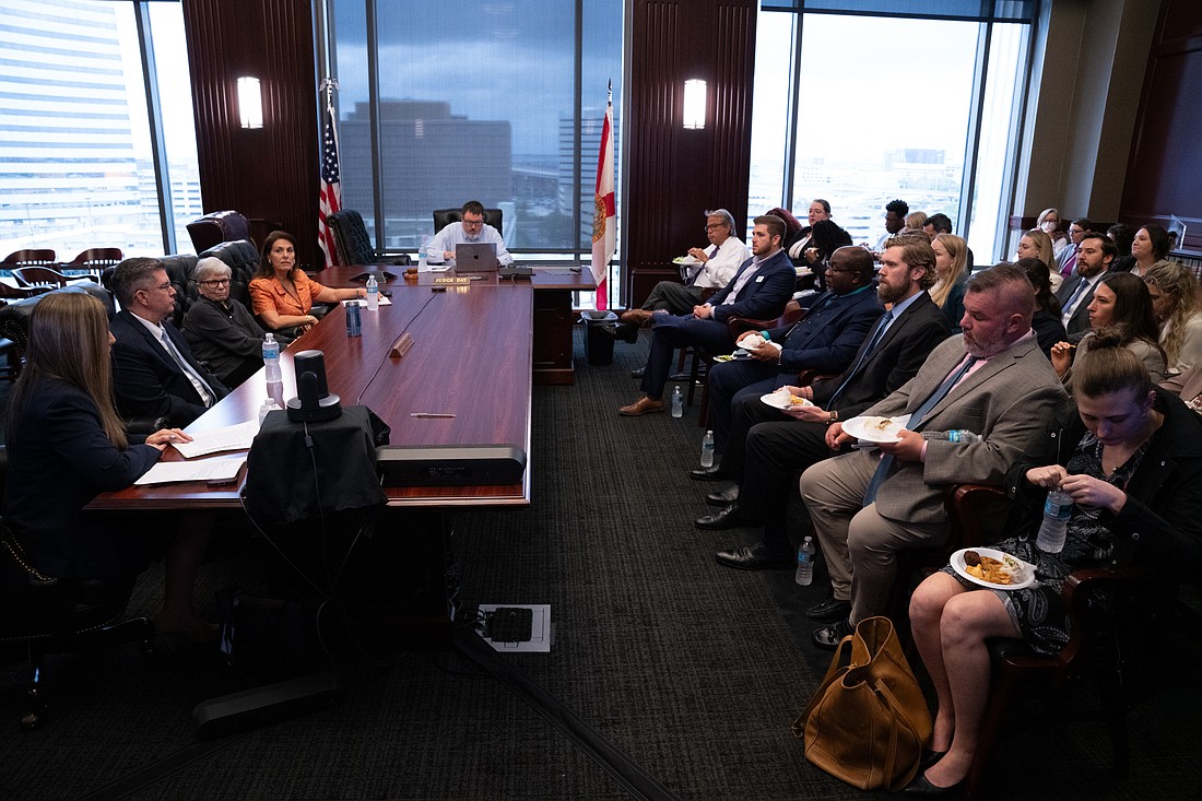 Circuit Judges Mark Borello, Meredith Charbula and Tatiana Salvador, at left, discussed professionalism and explained courtroom procedures in circuit criminal court in 4th Circuit Chief Judge Lance Day's chambers Sept. 10 at the Duval County Courthouse.