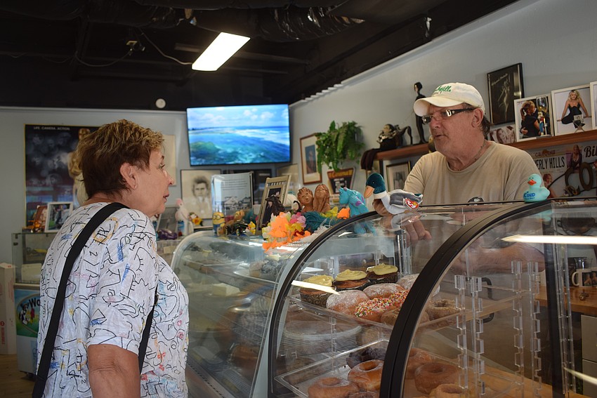 Karen Pashkow and Gary Hagen at Donuts By Design at Summer Night Out.