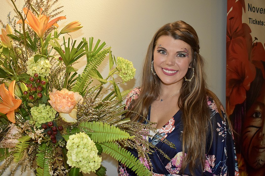 Ringling College graduate Joshua Hardinger demonstrated his artistic makeup for attendees including Allie Roman.