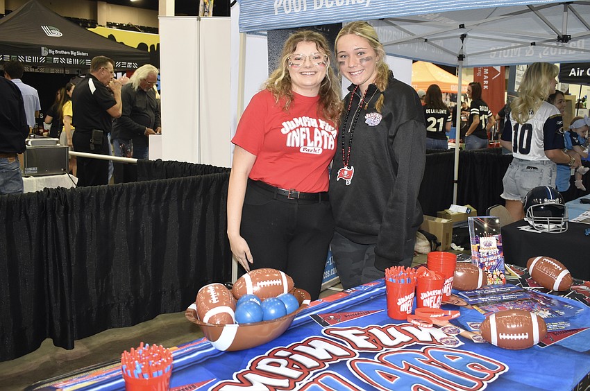 Sophia Ohmart and Brooke O'Brien helped represent Jumpin' Fun Inflata Park.
