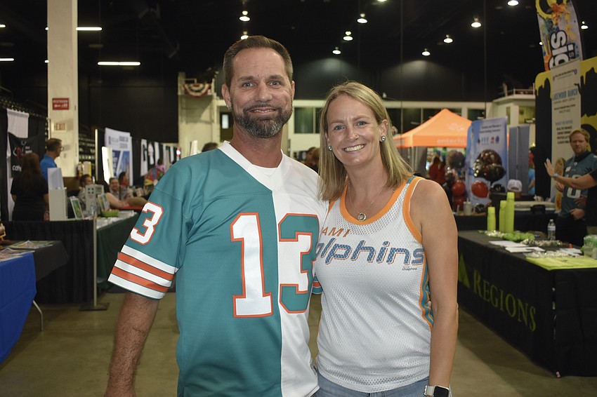 Demery Hamil and his wife Jennifer Hamil, of Koastal Klean, embraced the tailgate theme.