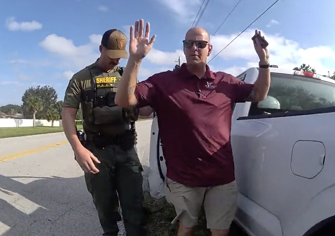 Flagler Sheriff Office deputies arresting Timothy Hickerson, 43. Image from FCSO body camera footage