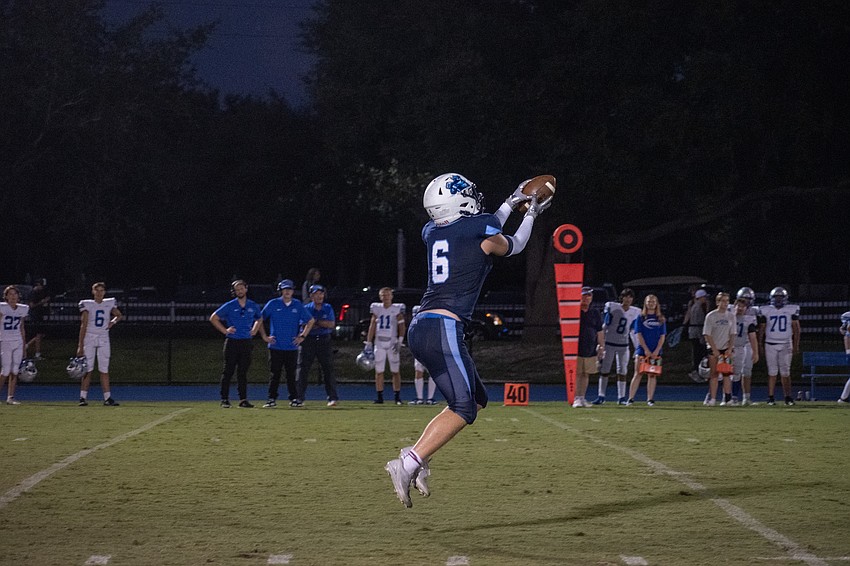 ODA junior tight end Winston Crisci secures a catch against Sarasota Christian.