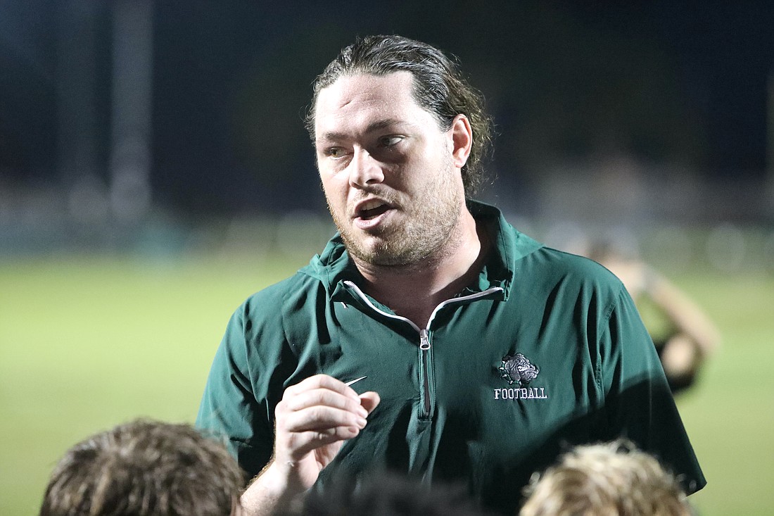 FPC football coach Daniel Fish talks to the players after the 2024 homecoming game. Photo by Brent Woronoff