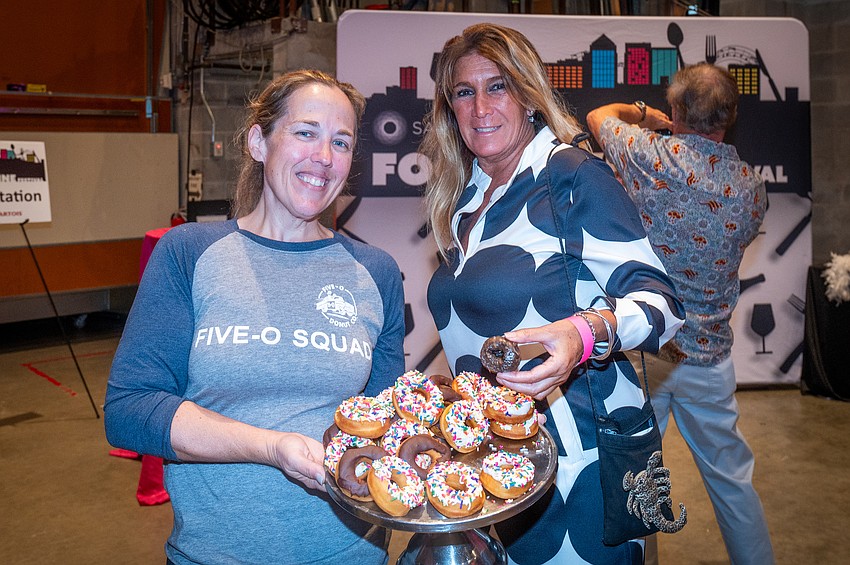 Christine Nordstrom and Elizabeth Gay with Five-O Donuts.