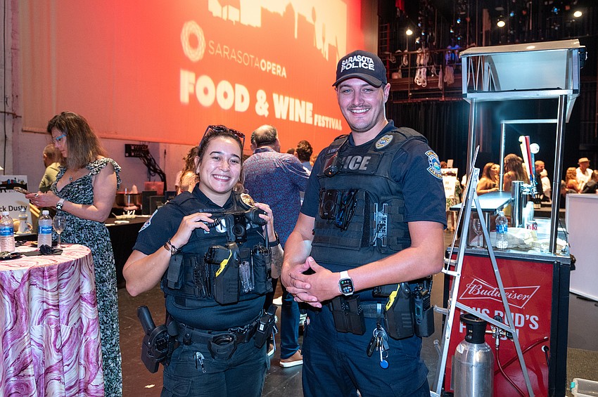 Bianca Alfalla and Nick Jones with Sarasota Police oversee the event.