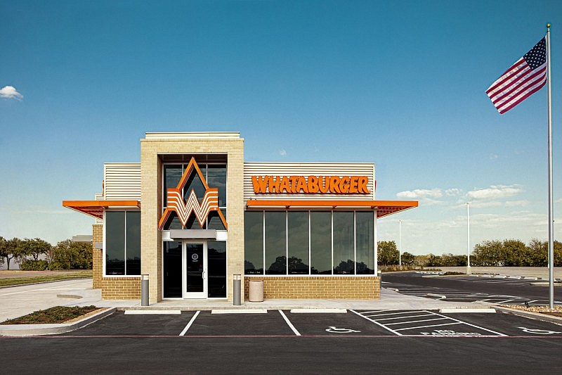 Brick veneer and metal touches are characteristic of Whataburger restaurants.