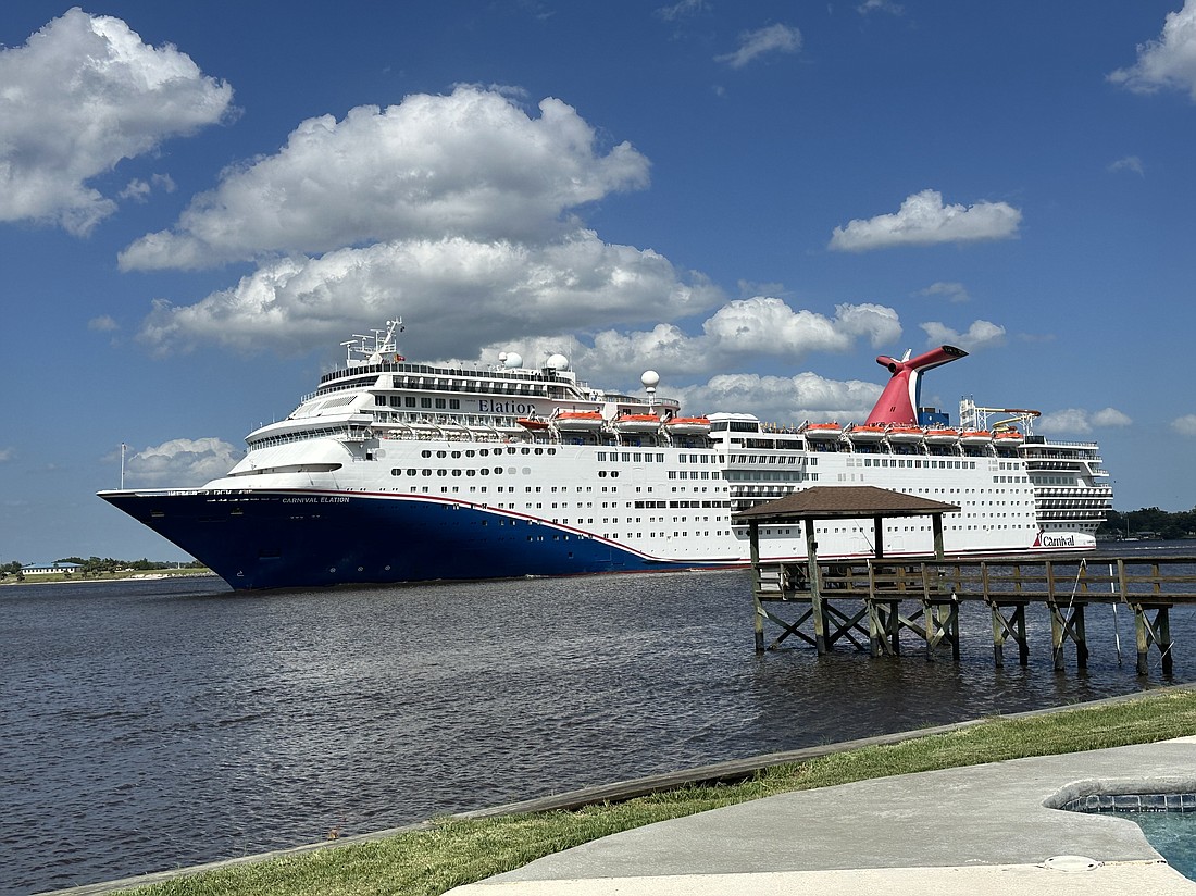 The Carnival Elation cruises down the St. Johns River as it returns to Jacksonville on Sept. 27.