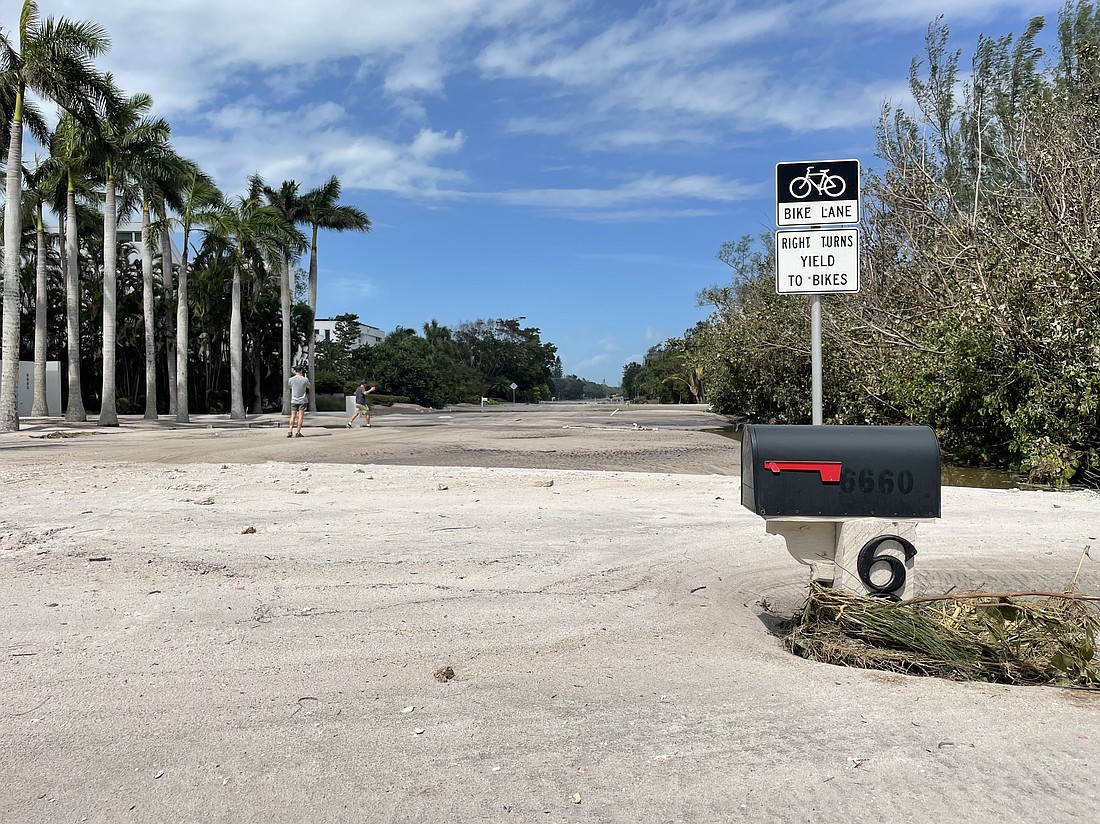 Sand from Longboat Key's beaches created dunes along Gulf of Mexico Drive after Hurricane Helene's storm surge.