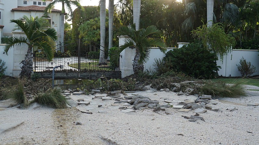 The pavers on some driveways were torn apart by the force of the storm sure.