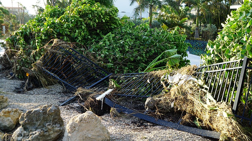 The surge in some places was strong enough to knock down metal fences.