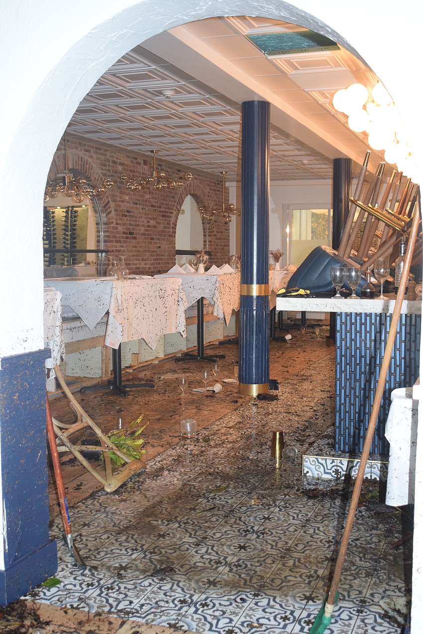The aftermath of Cafe L'Europe due to Hurricane Helene.