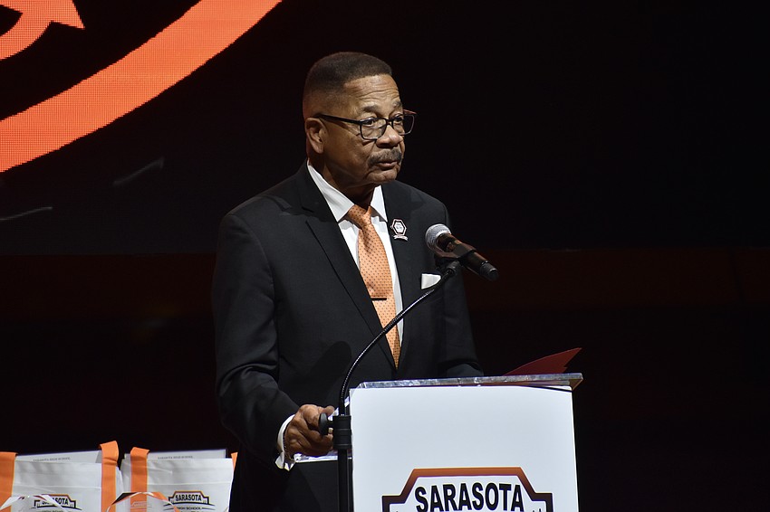 Hugh Yancy offers a speech.