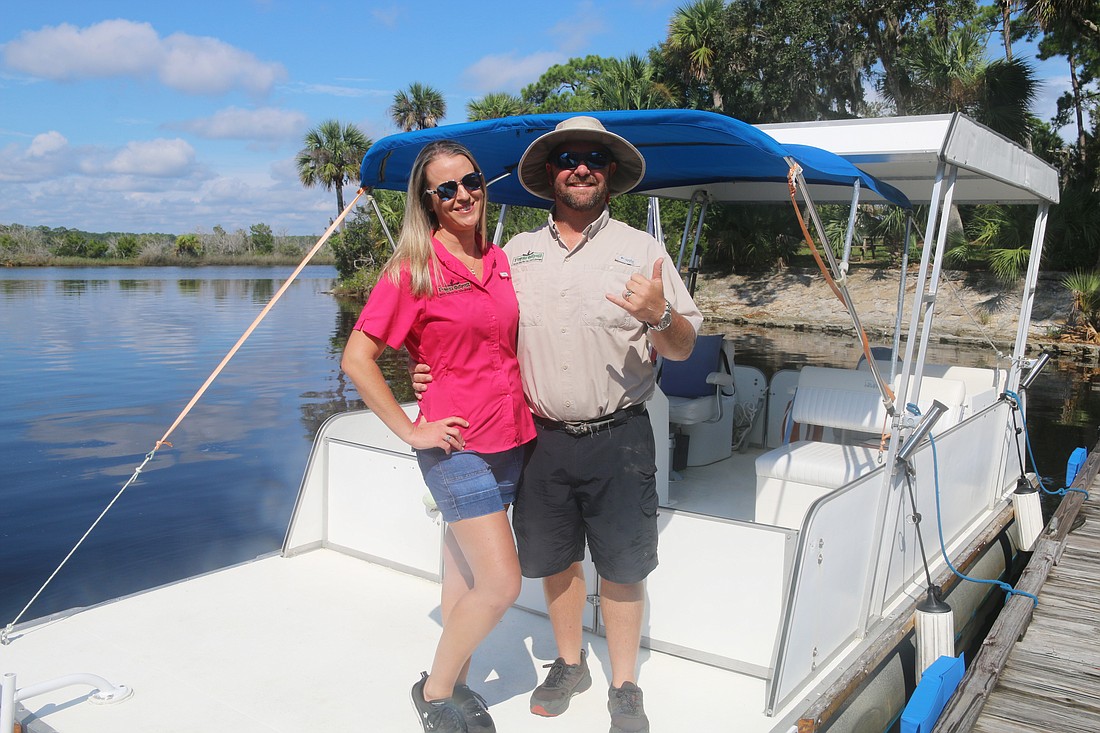 Ashley and Scott Cornelius recreate their photo from the 2014 ribbon-cutting of their boat charter business, The Good Life Charters. Photo by Jarleene Almenas