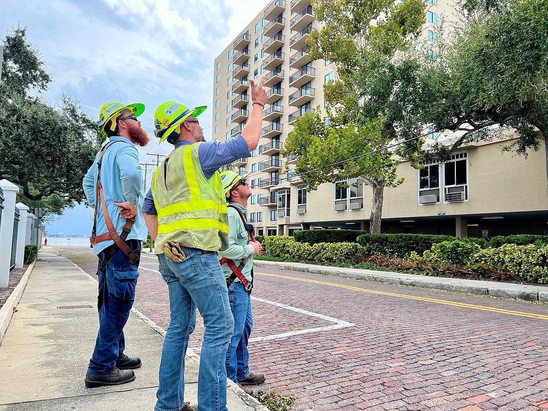 Tampa Electric crews work to restore power after Hurricane Helene.