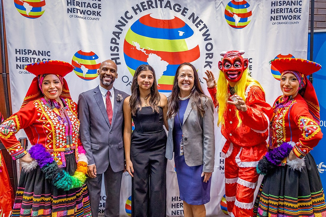 Maria Daniela La Cruz Cegarra, third from left, received the award from the Hispanic Heritage Network of Orange County. She was nominated for the award by District 1 Commissioner Nicole Wilson.