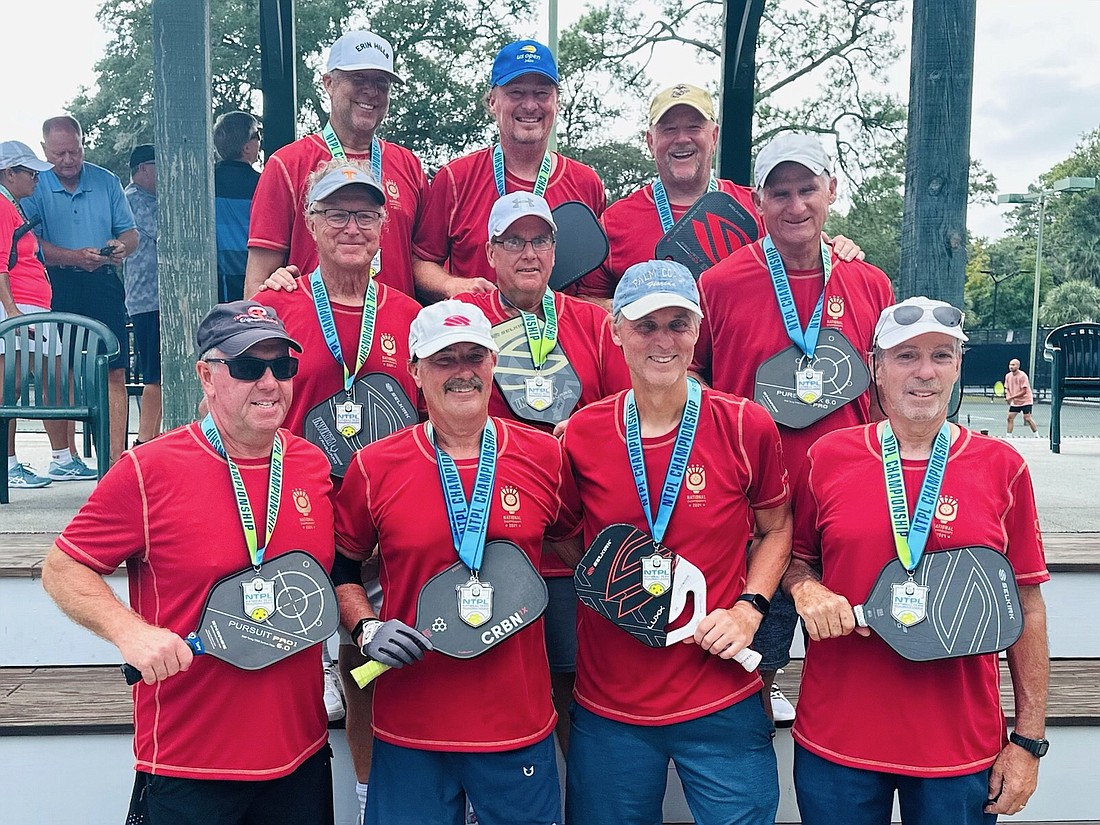 Mala Magic pose with their silver medals. Top row: Dale Claussen, Larry Mackey, Bobby Cabaniss. Middle row: Tommy Boone, Dan Delevante, Richard Gaskalla. Bottom Row: Tony Scirbona, Ken Schwamb, Steve Jacobovitz, George Carlone. Not pictured: Todd Emery. Courtesy photo