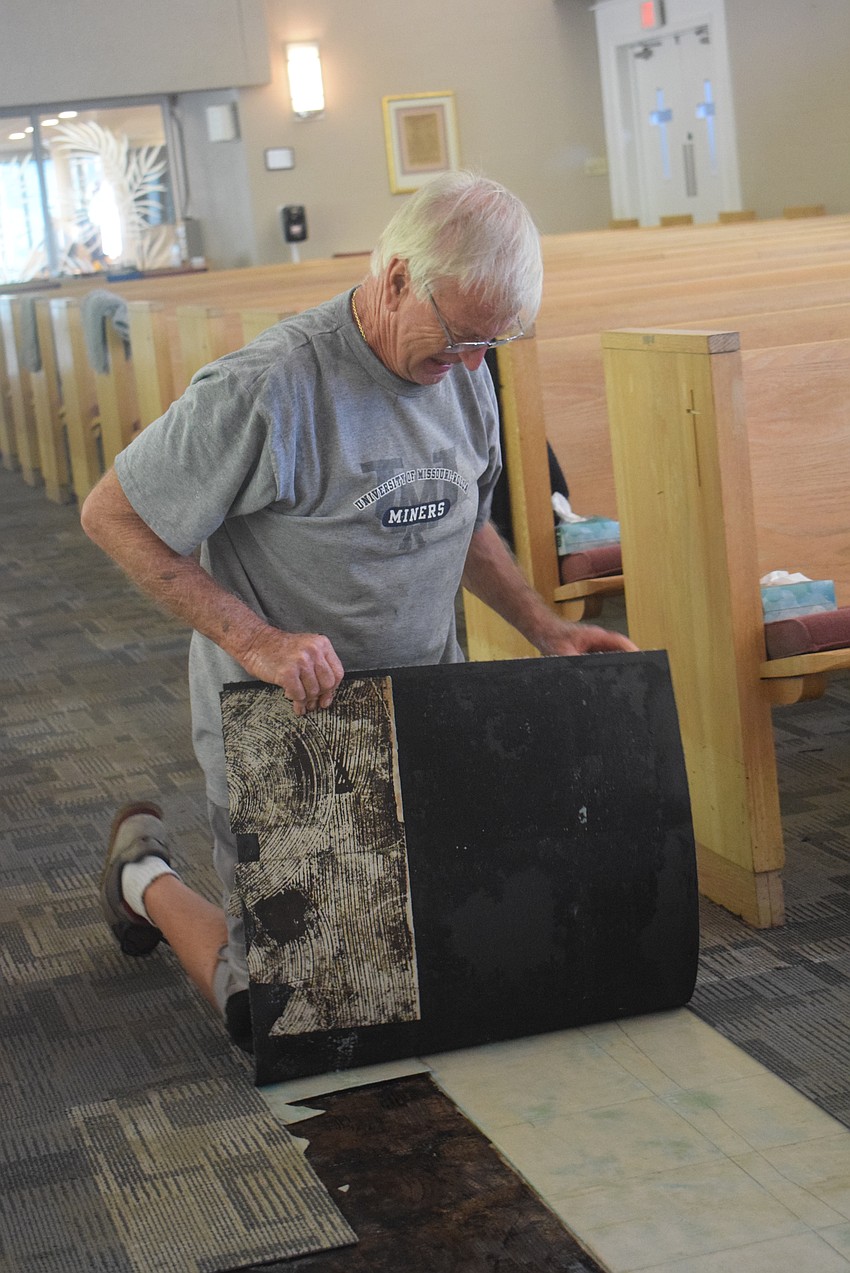 Richard Engels volunteers to clean up the Longboat Island Chapel after Hurricane Helene.
