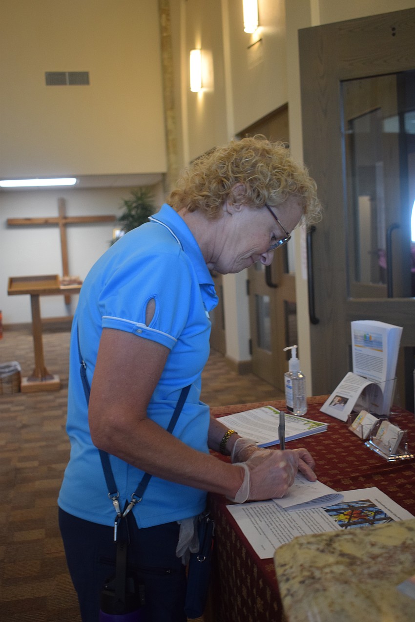 The Rev. Julia Piermont organizes her office in the main church building at Christ Church of Longboat Key.